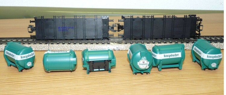 1607815631_2022-03-2613_12_08-Mrklin48944wagonsplatstypeBt10conteneursbireKnigsbacherDBBO.thumb.jpg.5196568303b0966b56c1c517727bfd41.jpg